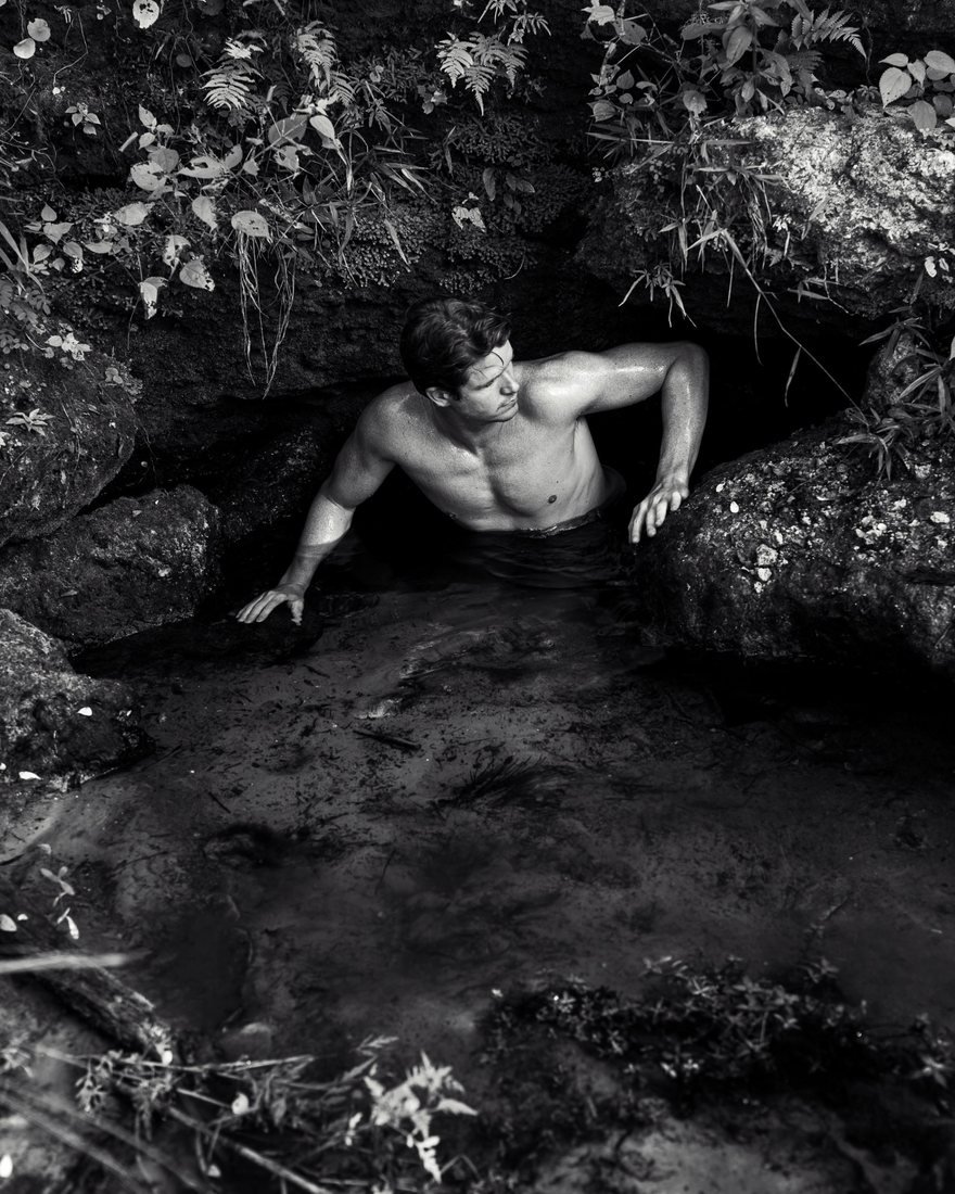 Brandon in a spring among rocks and ferns, black and white